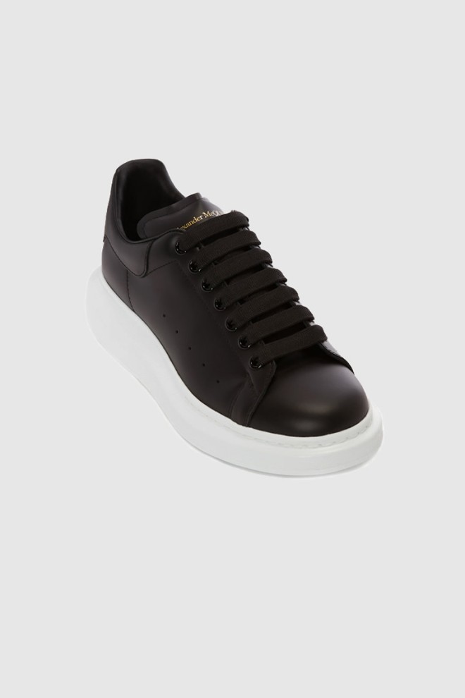 ALEXANDER MCQUEEN Black men's sneakers with white sole