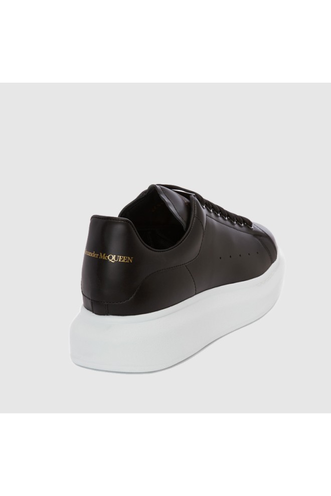 ALEXANDER MCQUEEN Black men's sneakers with white sole