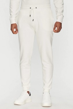 GUESS Białe spodnie męskie...