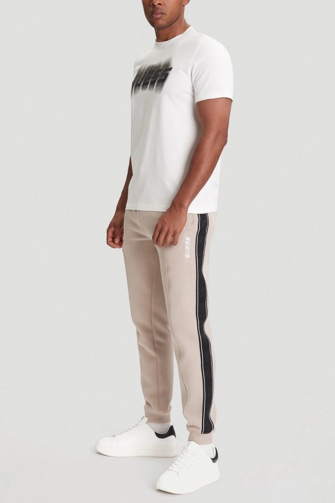 GUESS Beige men's pants with Mickey stripes