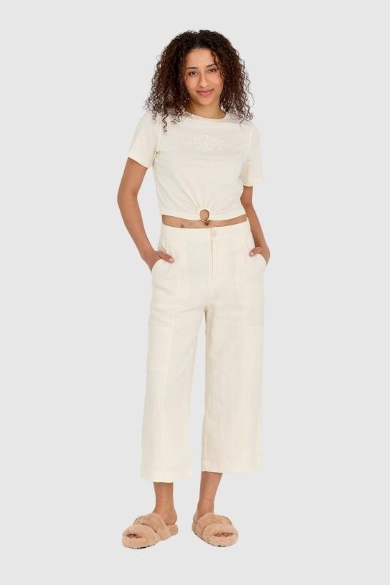 GUESS Kremowy t-shirt damski cropped fit piercing