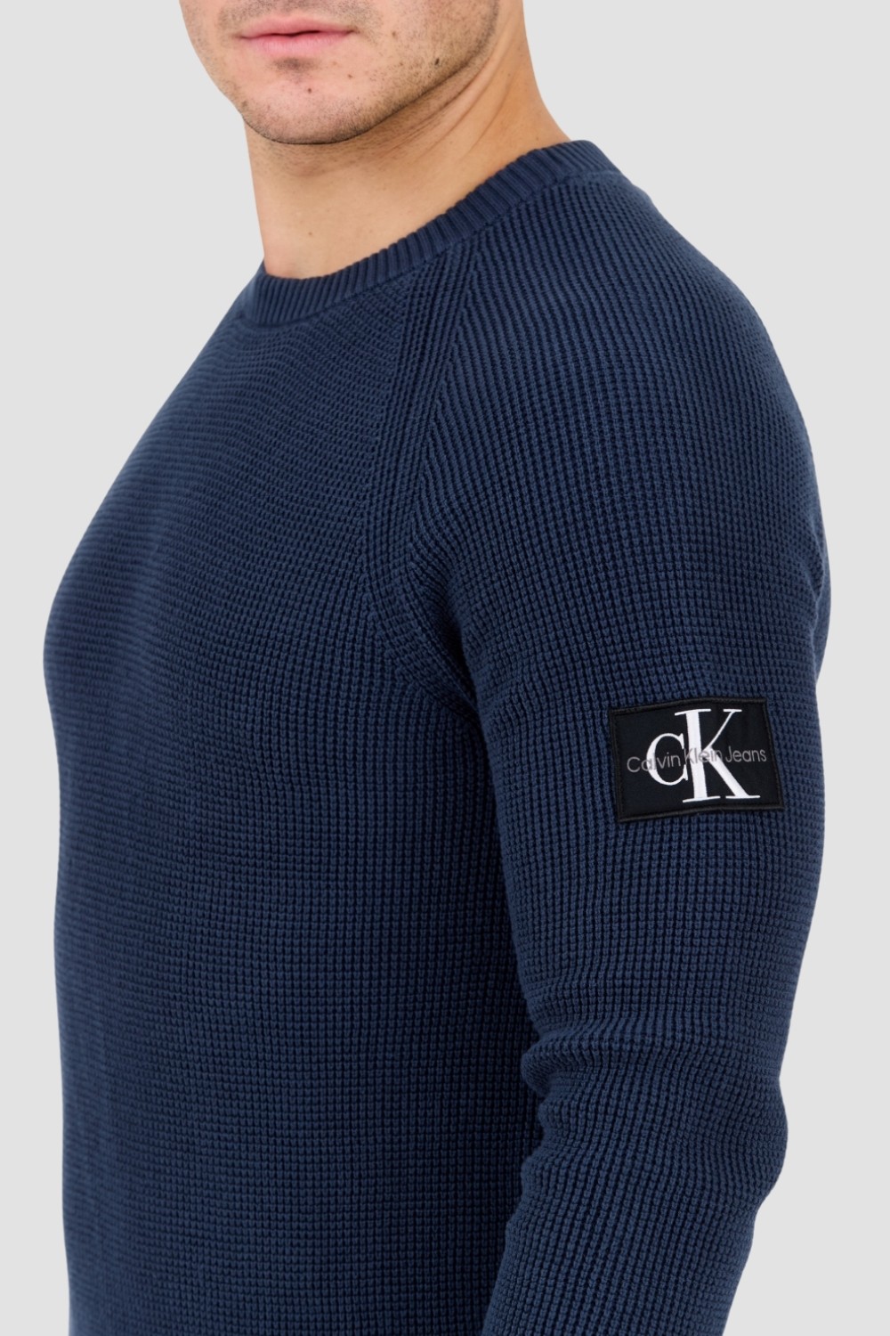 CALVIN KLEIN Granatowy męski sweter z naszywką