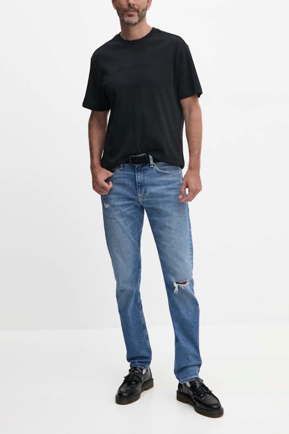 CALVIN KLEIN Błękitne męskie jeansy Slim Taper