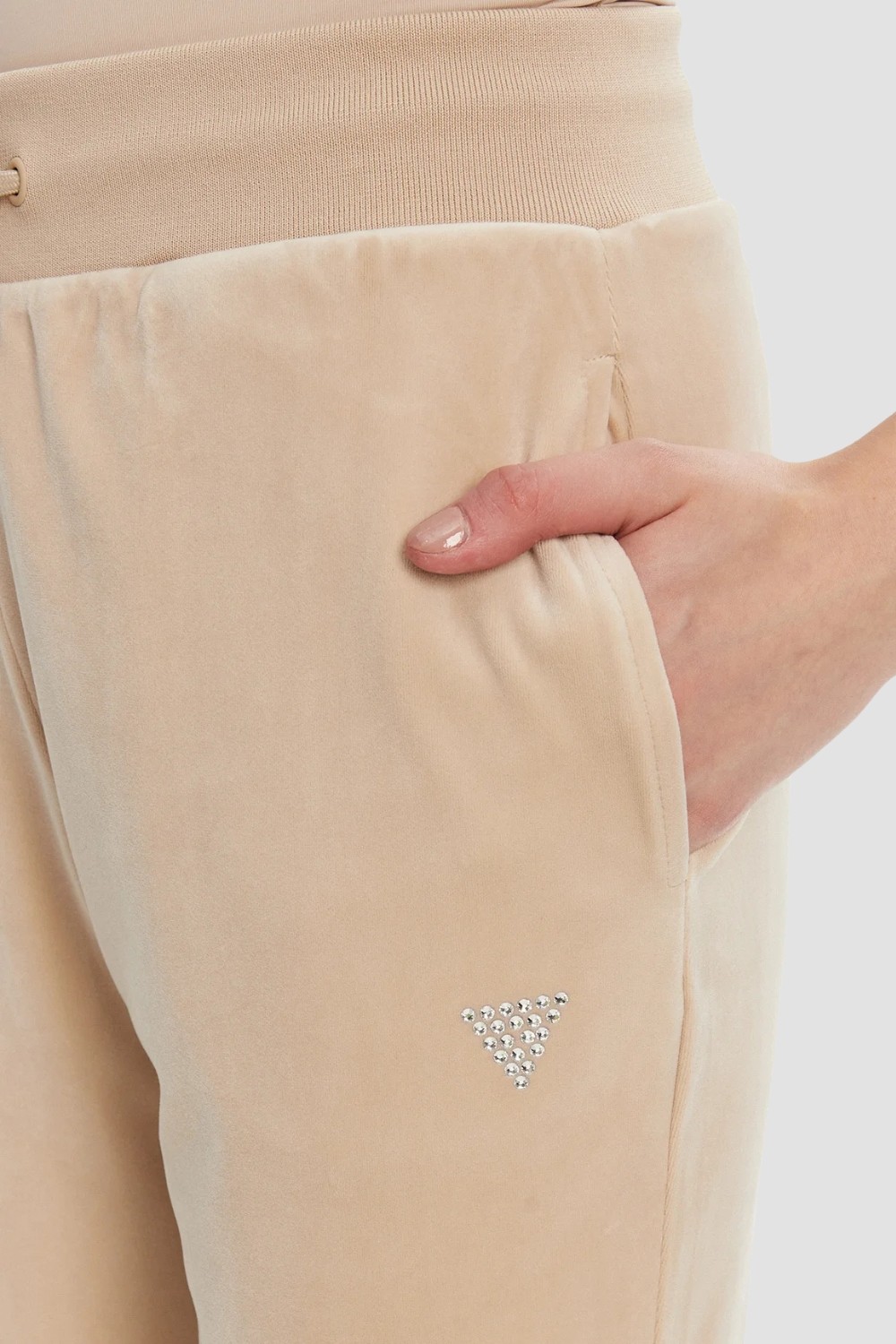 GUESS Beżowe damskie spodnie dresowe Couture