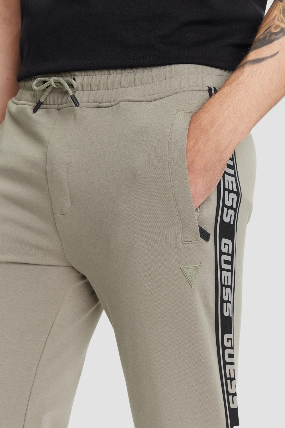 GUESS Zielone męskie spodnie dresowe z lampasami New Arlo